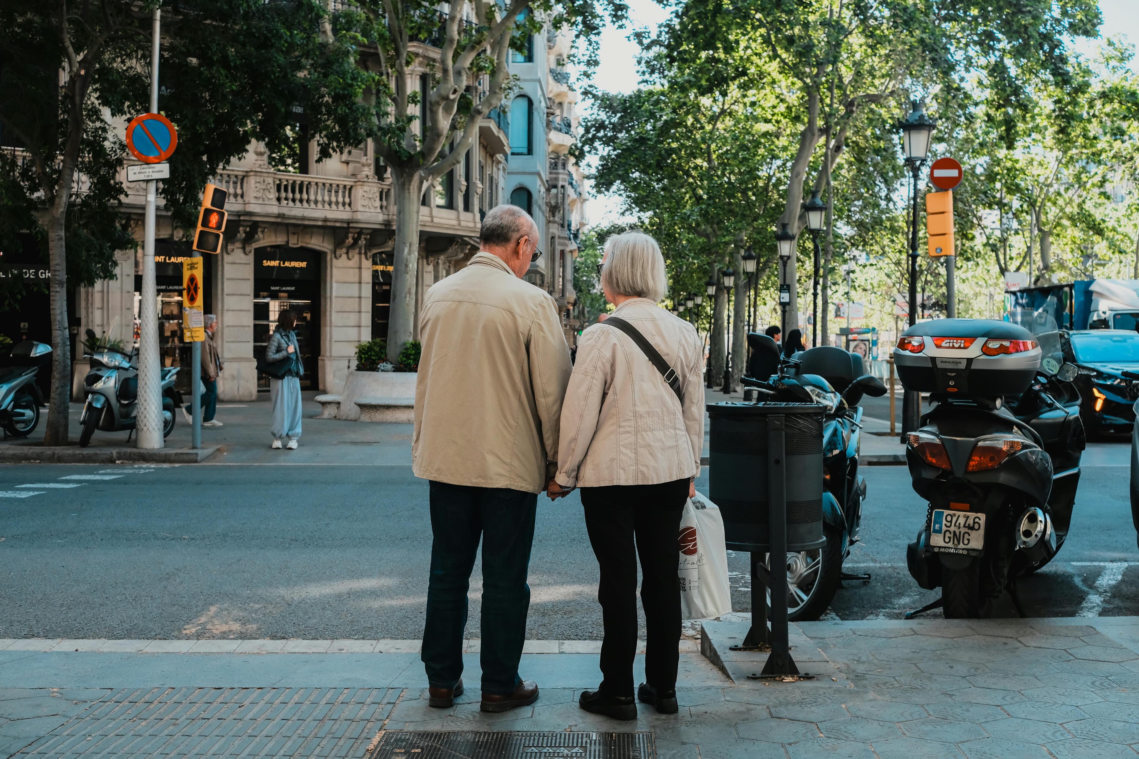 A couple walking through a city as they imagine life abroad